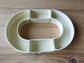 Modular Art Deco centrepiece by Clarice Cliff, 1930.