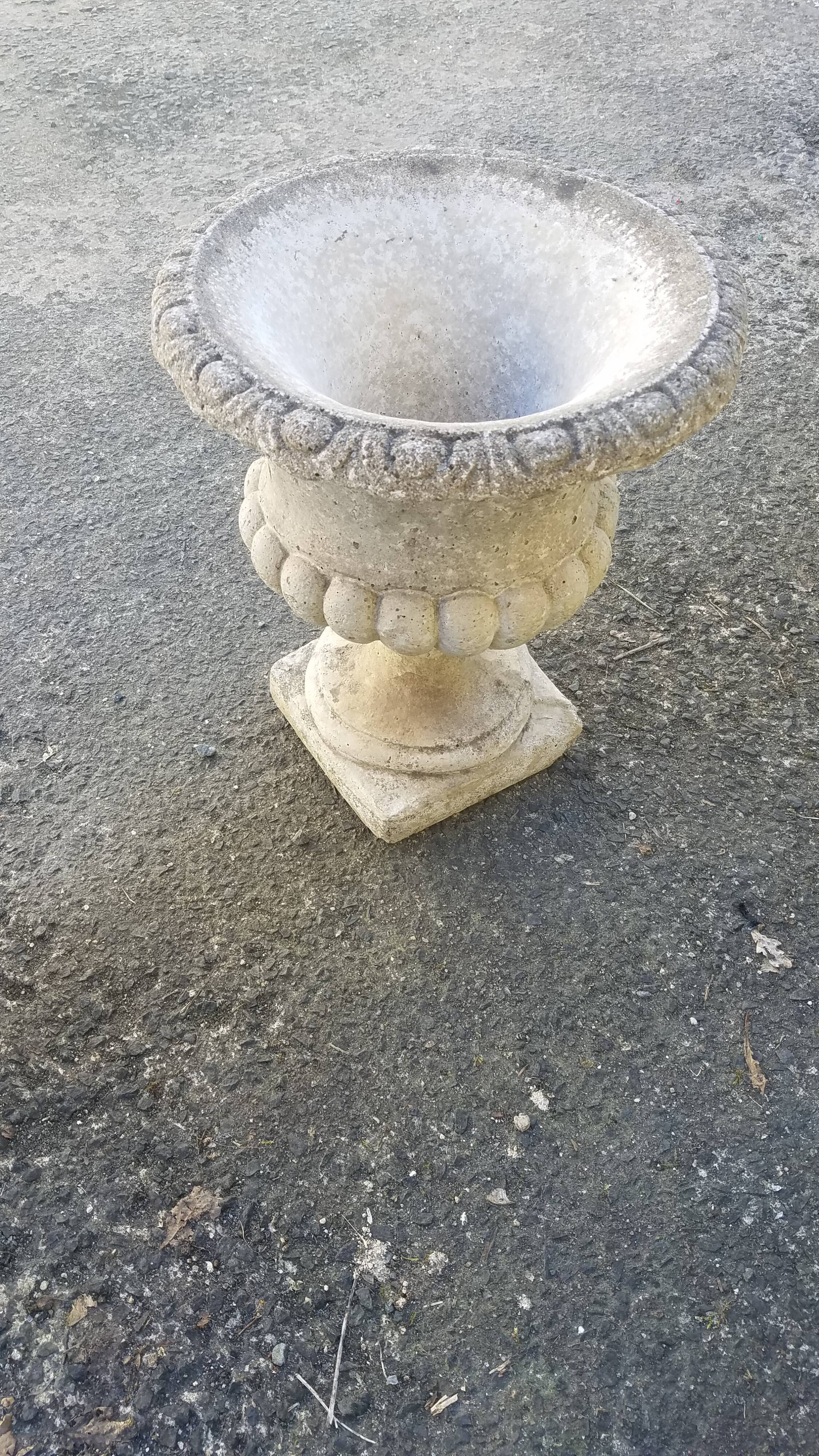 Pair of mediterranean vases in reconstructed stone