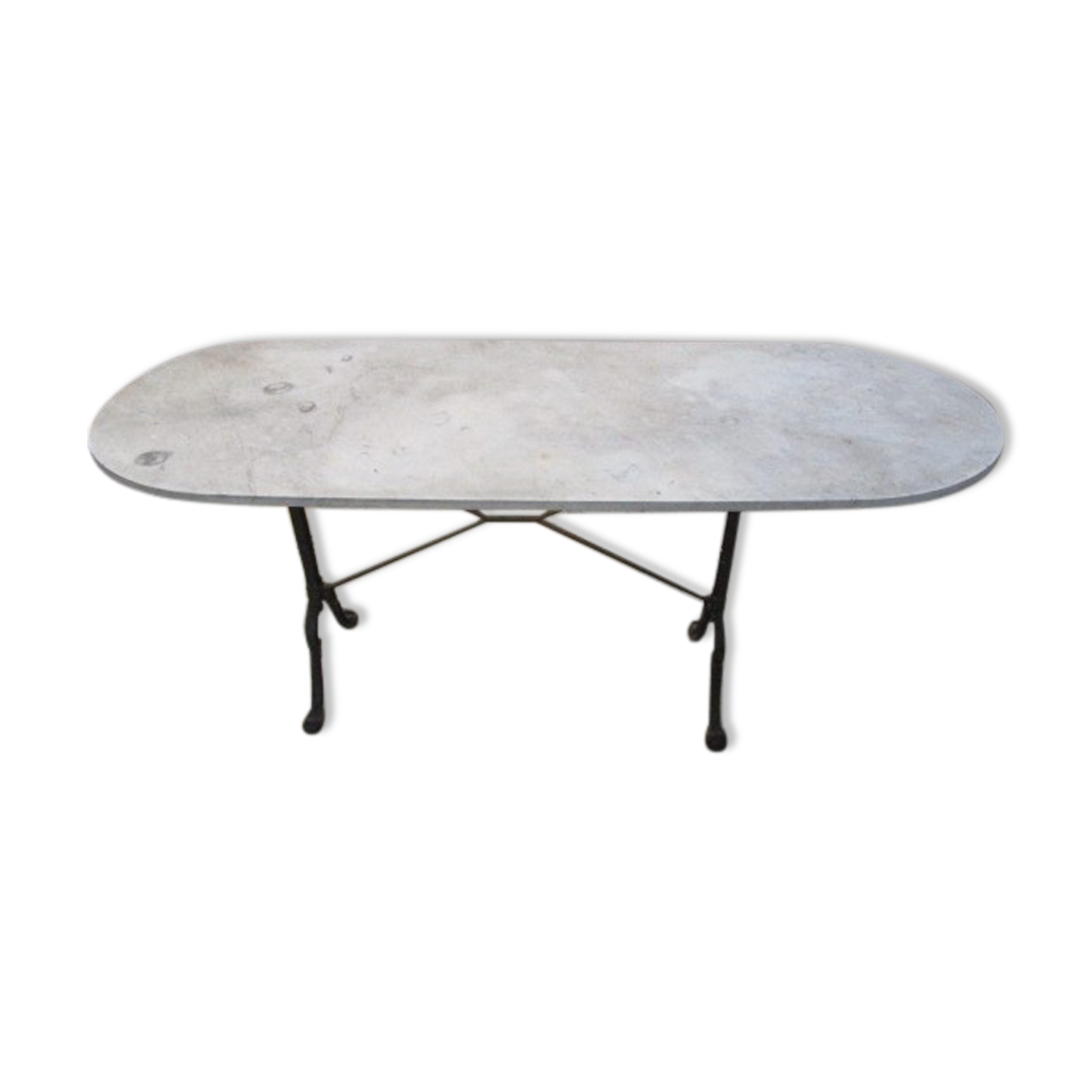 Old bistro table in marble and godin cast iron foot