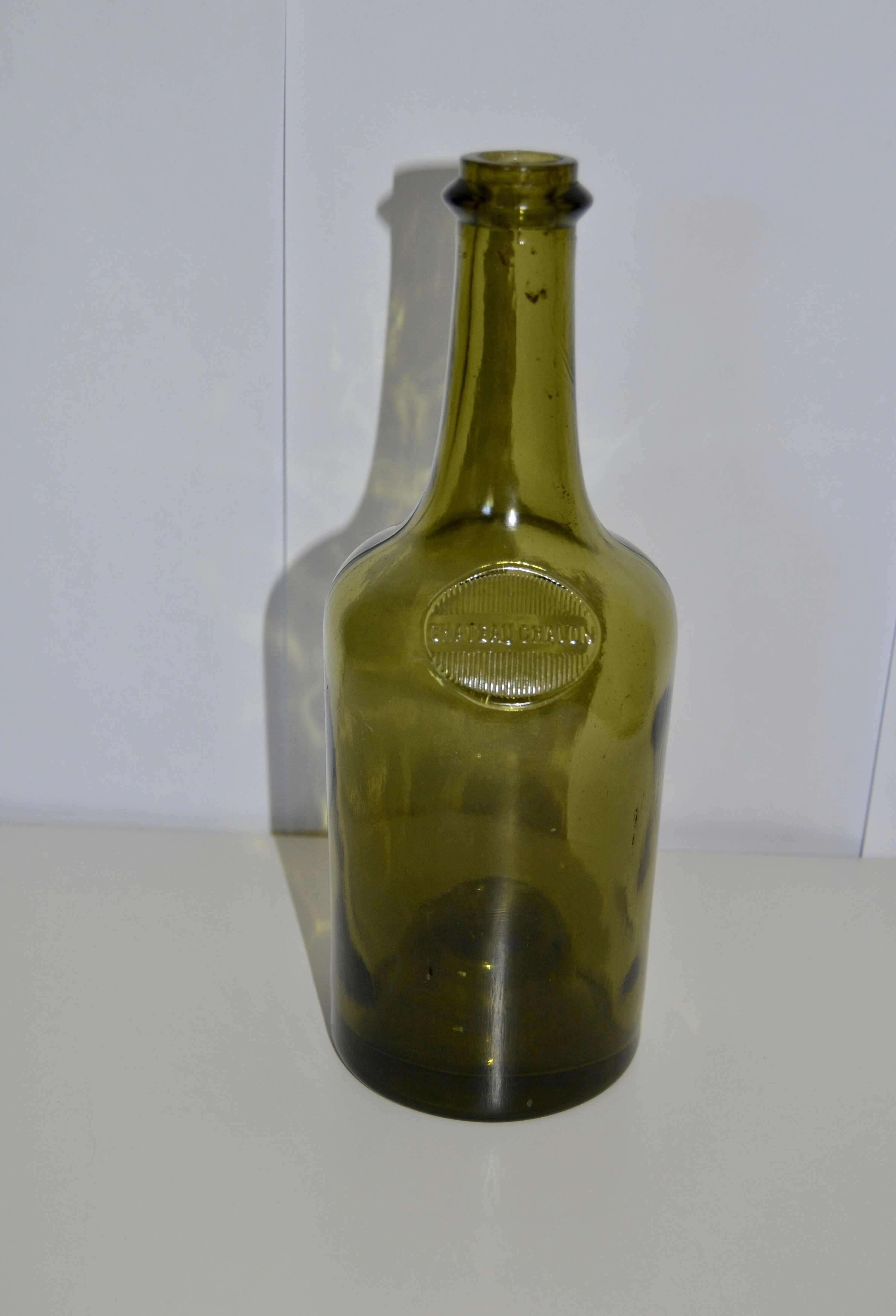 Château Chalon green glass bottle