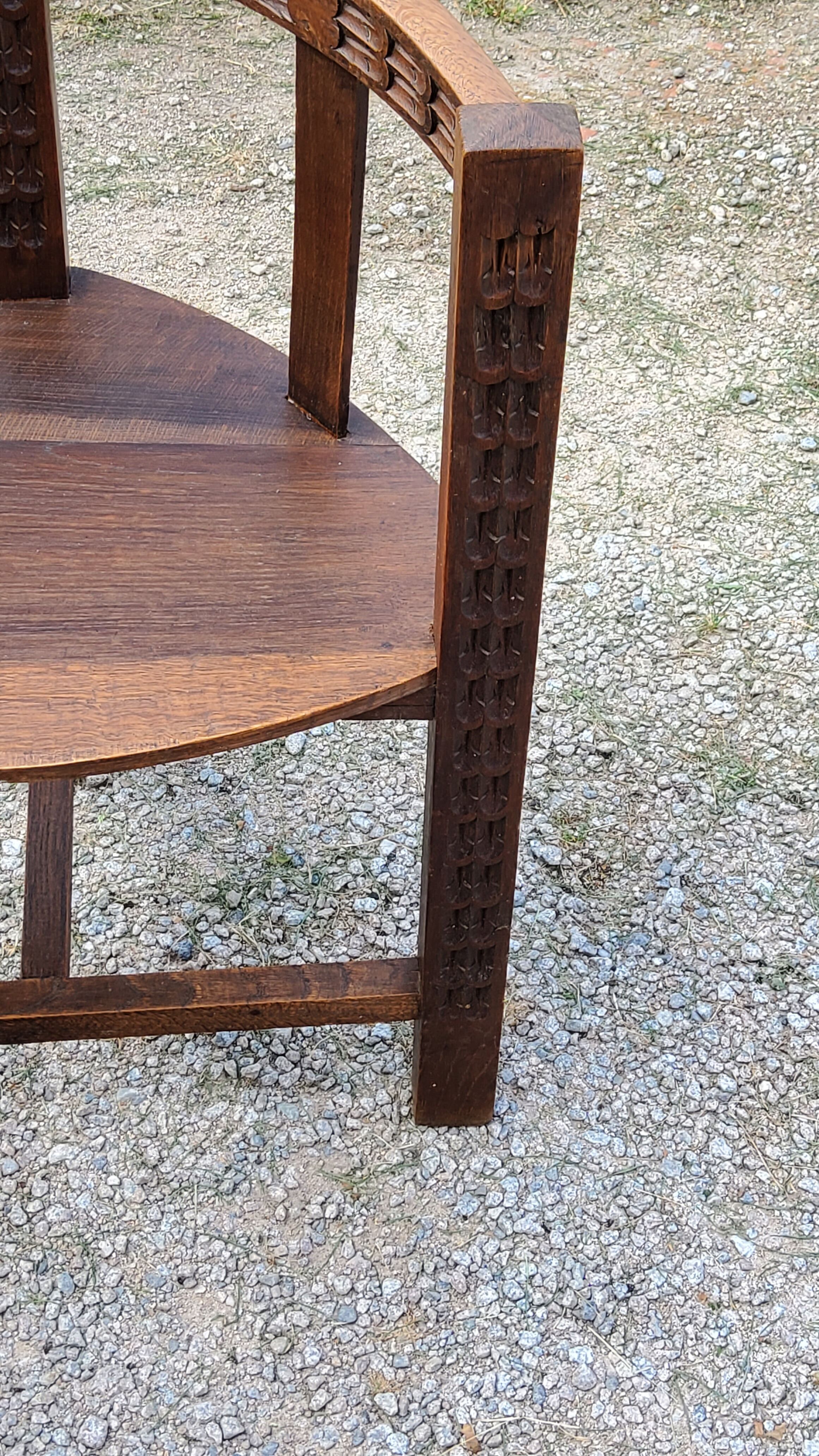 Set of three brutalist tripod armchairs in carved solid oak