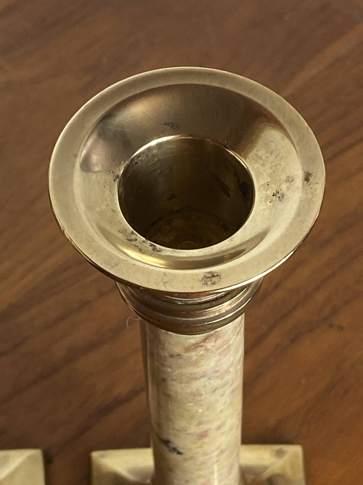 Pair of brass and stone candlesticks
