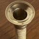 Pair of brass and stone candlesticks
