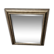 Beveled mirror under gold frame