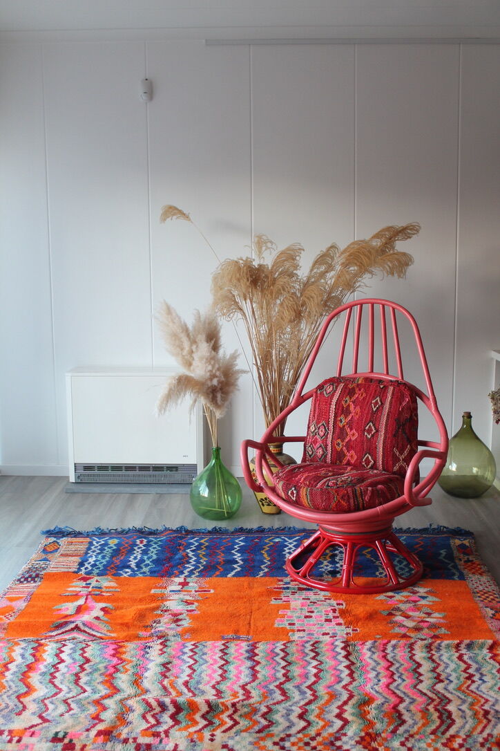 Restored vintage 70s armchair with custom-made Moroccan cushions, pink and red armchair
