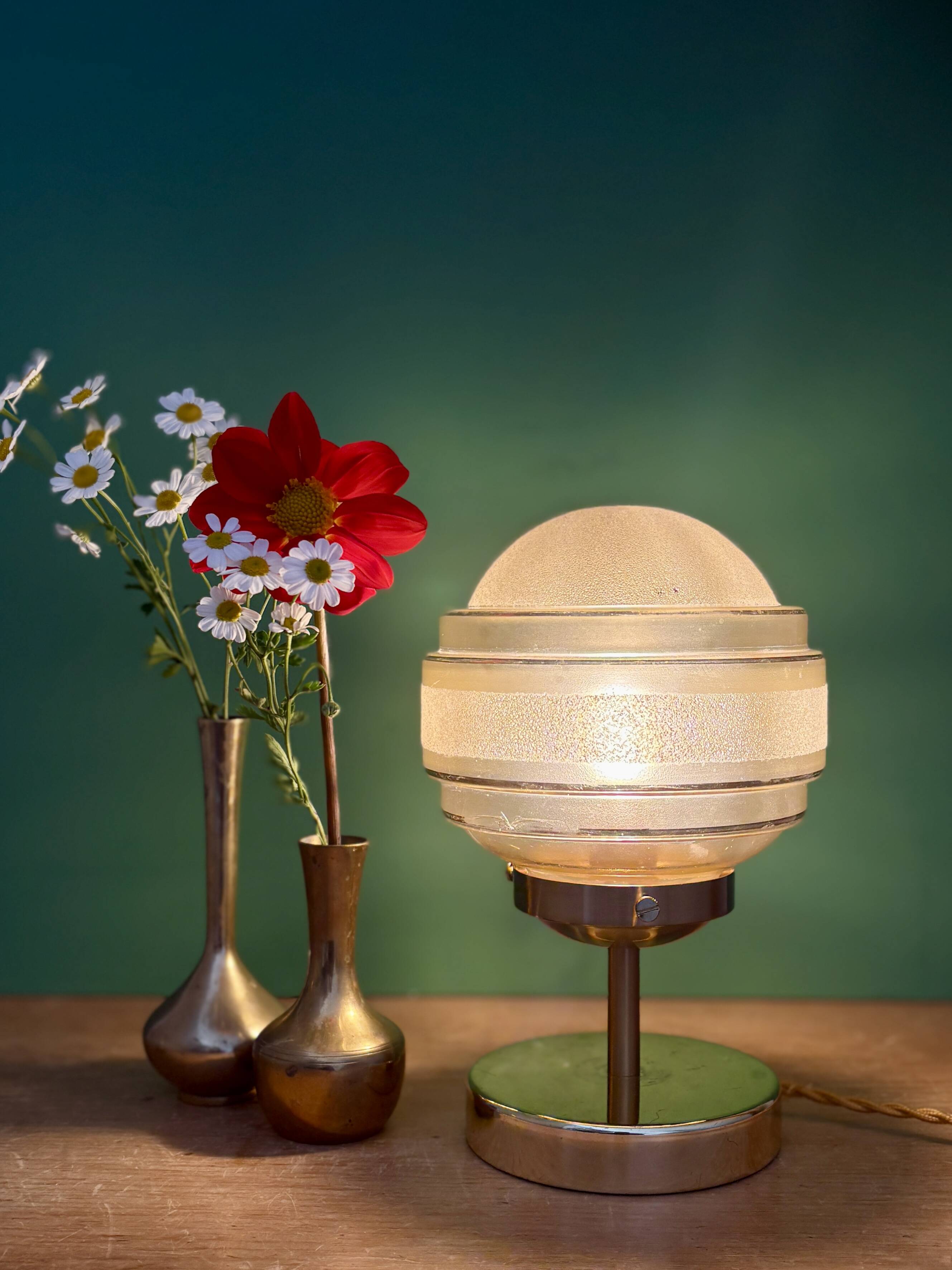 Vintage globe table lamp in frosted yellow and gold glass.