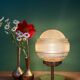 Vintage globe table lamp in frosted yellow and gold glass.