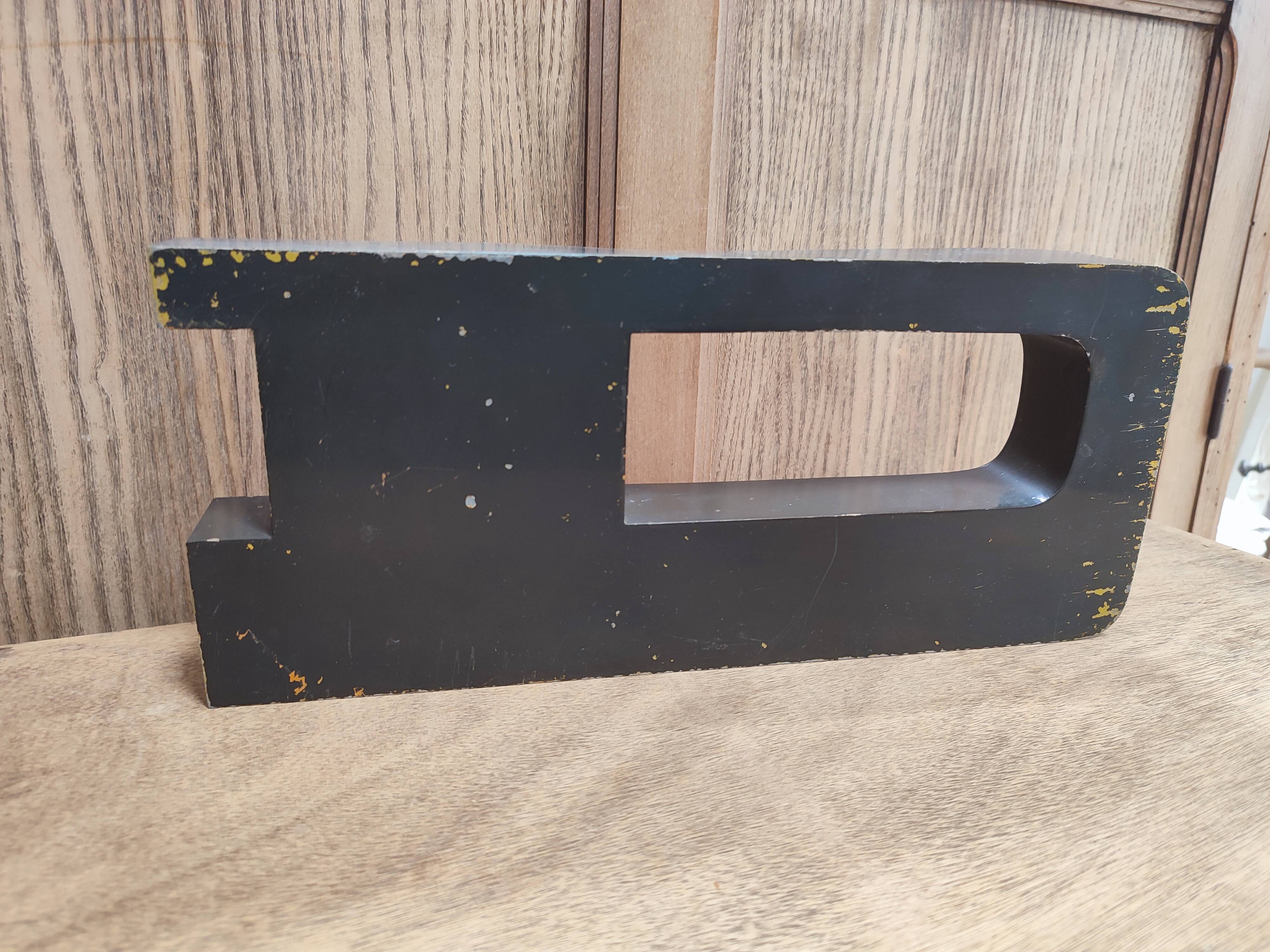 Vintage sign letter D