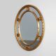 20th century neo-classical style tilted oval mirror by Deknudt, Belgium