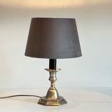 Steel candlestick lamp and grey velvet