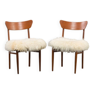 Danish solid teak mid century chairs in Hans Wegner style in long hair sheepskin, 1960s