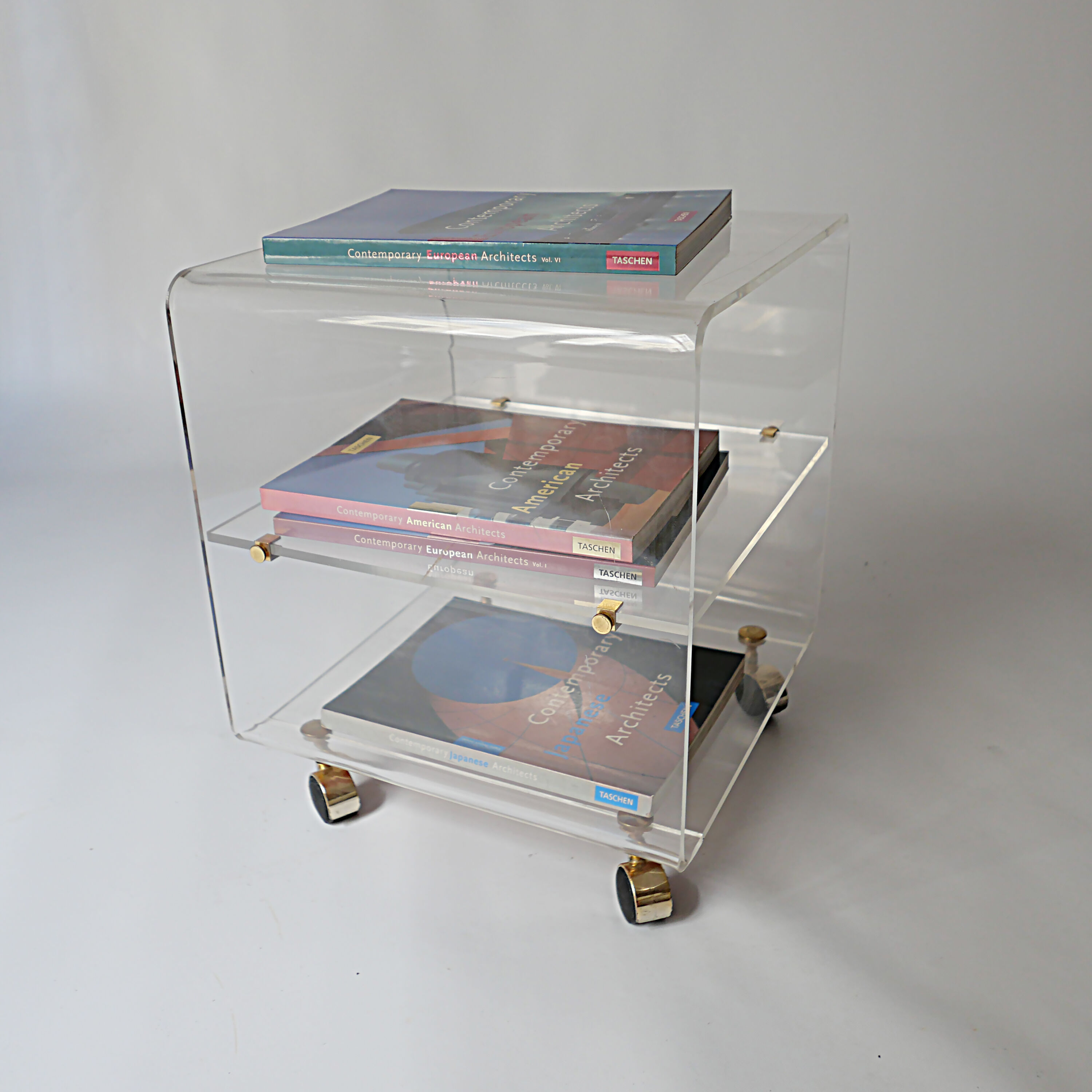 side table on wheels in plexiglass designed by David Lange 1970