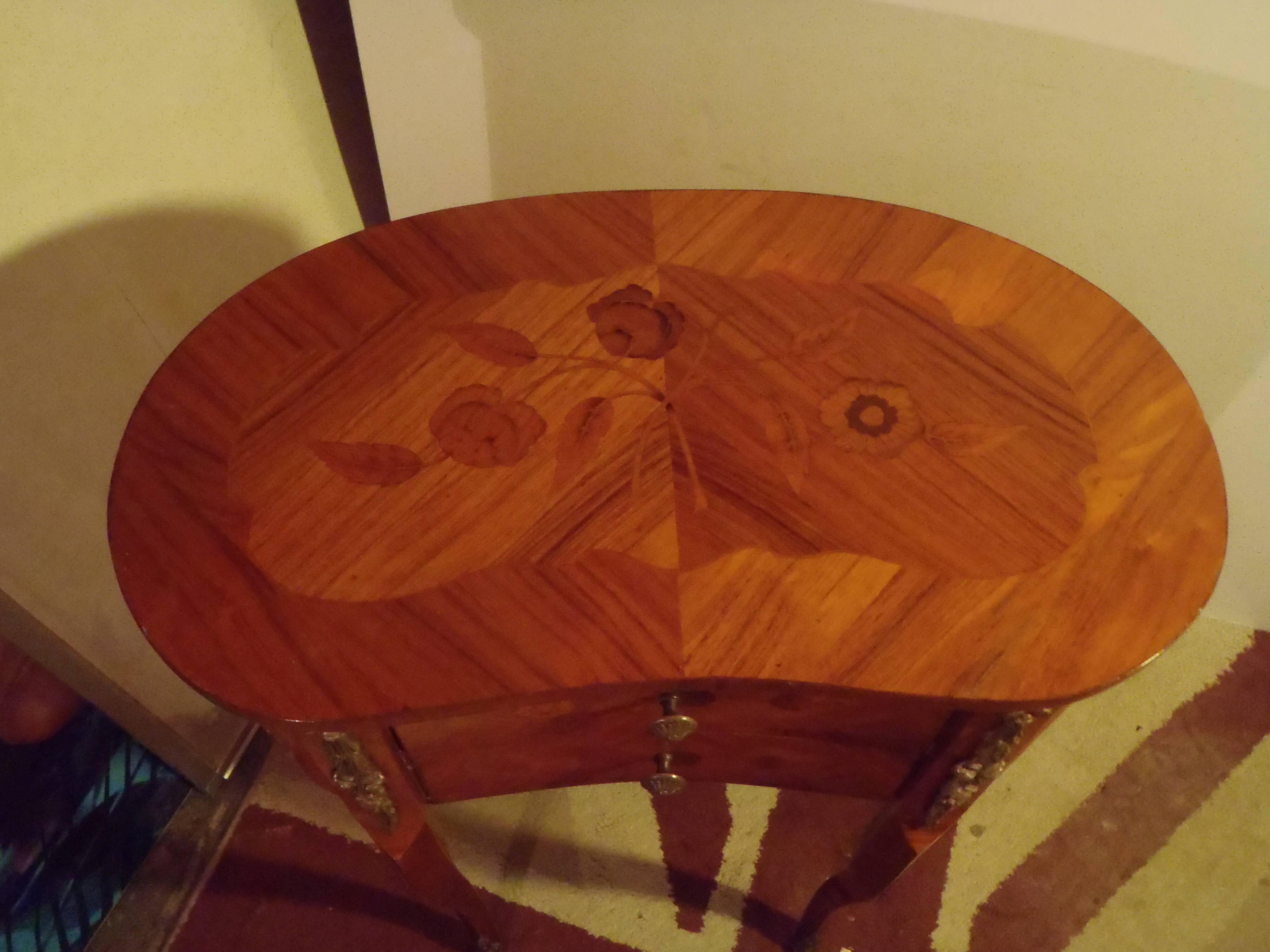 Louis XV style bedside table with varnished marquetry.