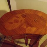 Louis XV style bedside table with varnished marquetry.