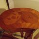Louis XV style bedside table with varnished marquetry.