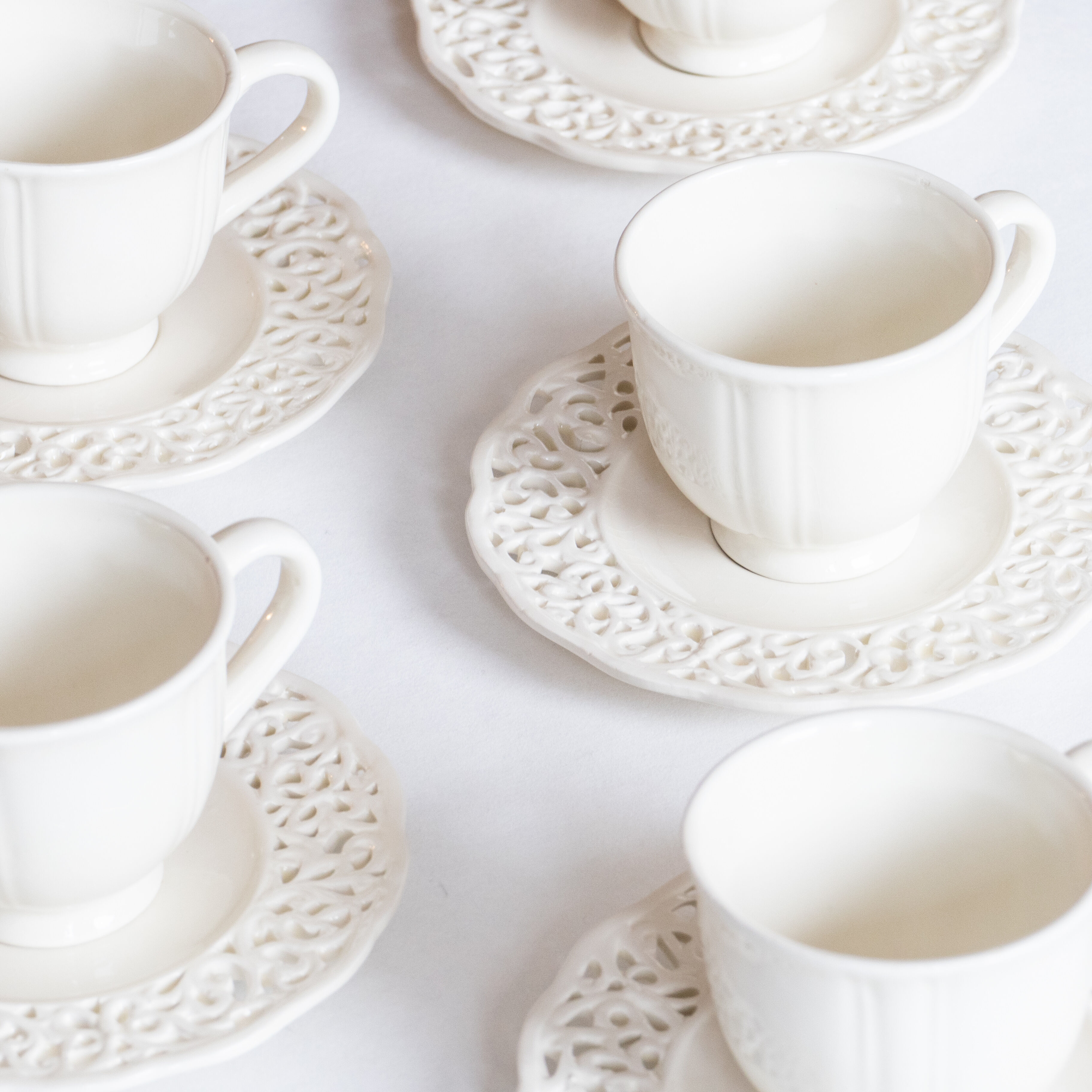 6 antique cups in openwork lace earthenware