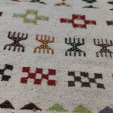 White carpet with multicolored Berber patterns handmade