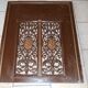 Pair of cast iron door grilles with its coat
