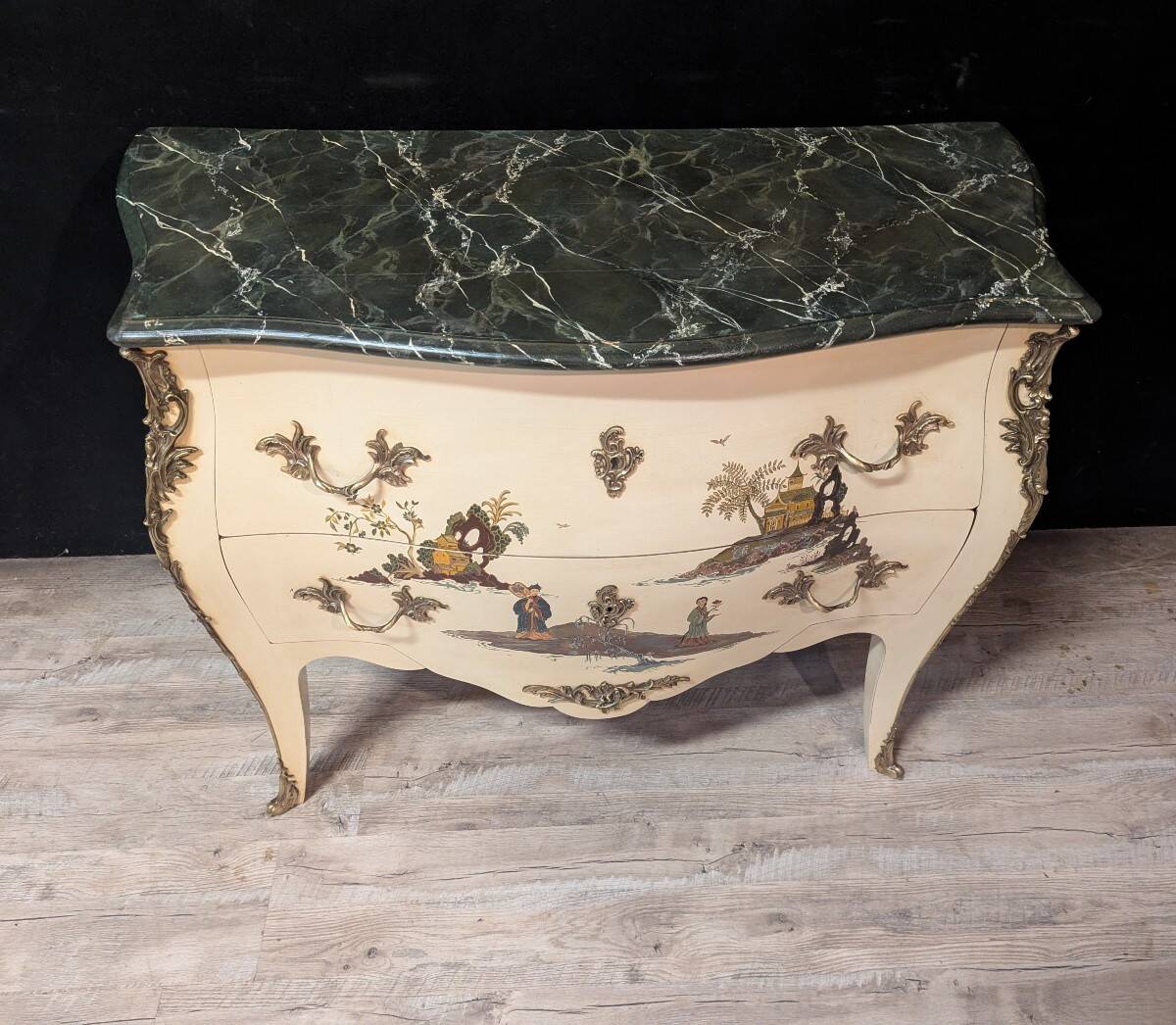 Curved Louis XV style commode with chinoiserie decoration.