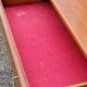 Chest of drawers from the 50s-60s in golden mahogany 4 drawers feet bobbin
