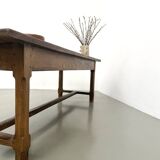 Authentic French farmhouse table from 1890 in solid oak with two drawers.