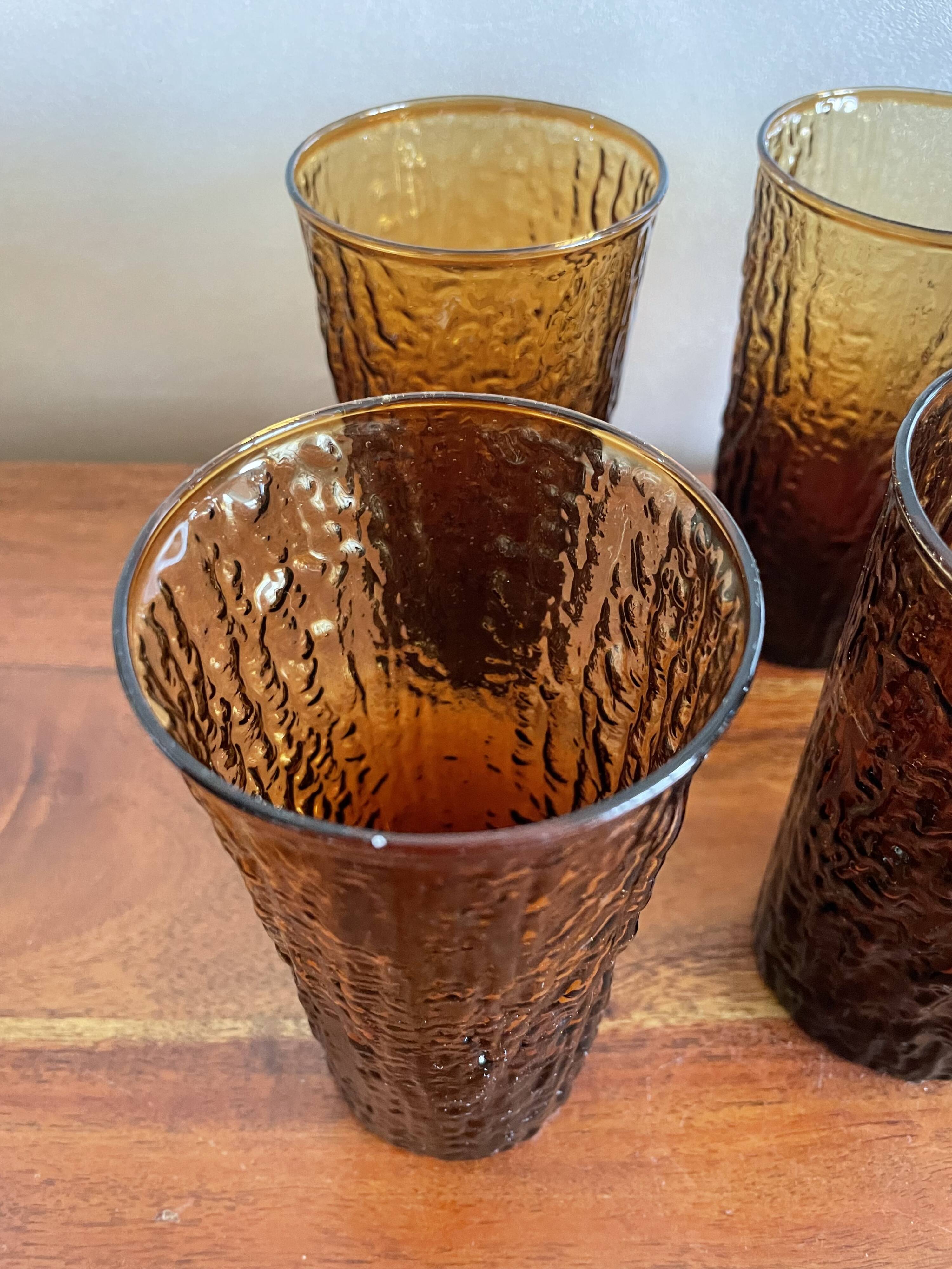 6 orangeade glasses with tree bark