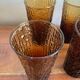 6 orangeade glasses with tree bark
