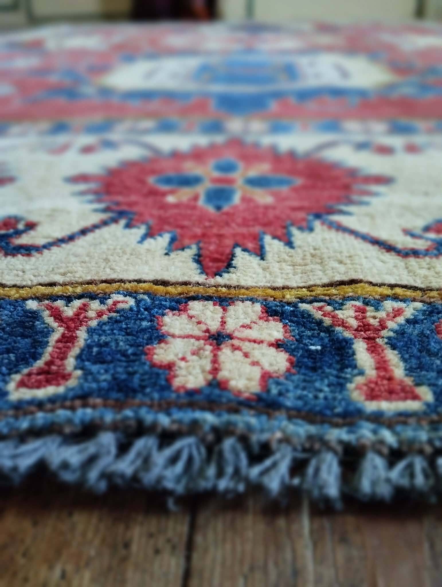 Handmade Pakistani Kazak rug 303x225cm