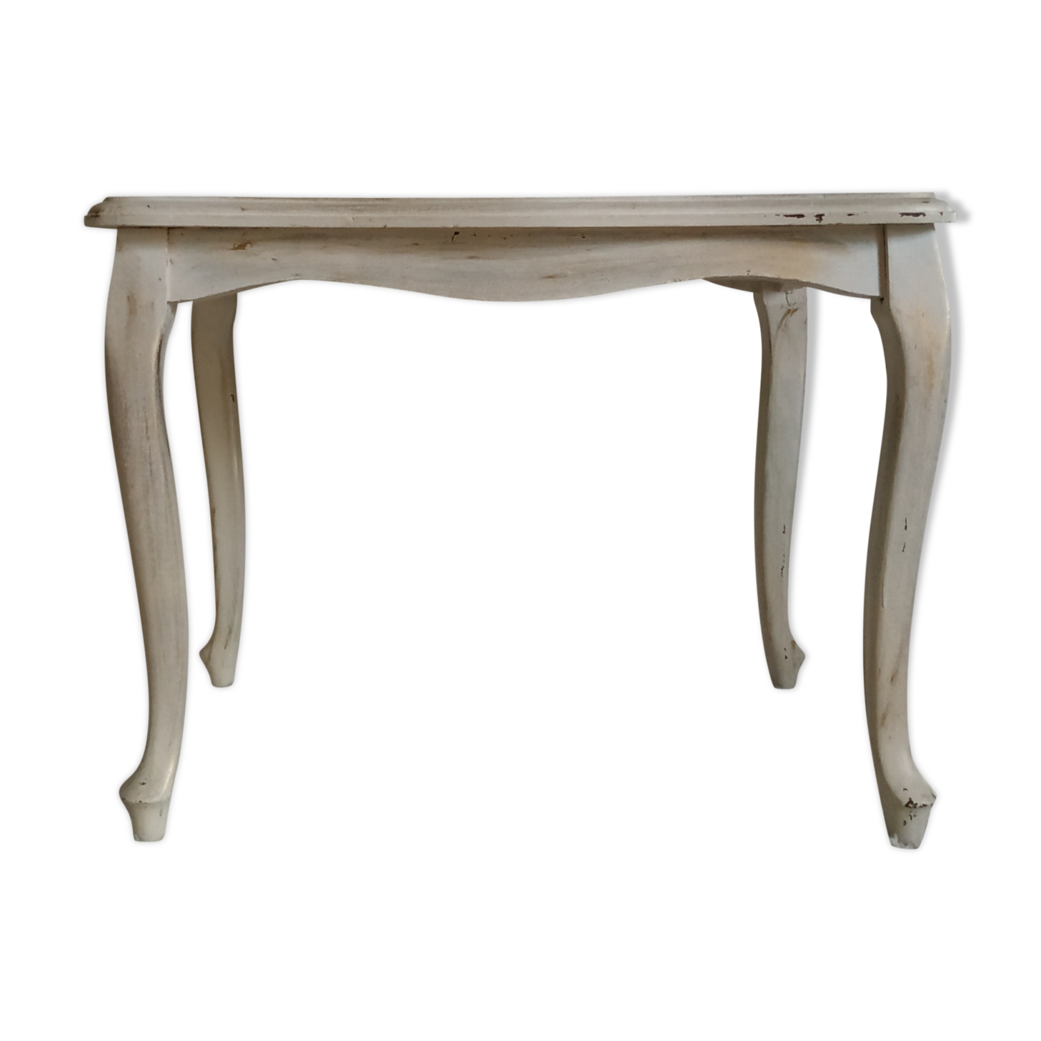 Old patinated coffee table and curved feet