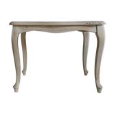 Old patinated coffee table and curved feet