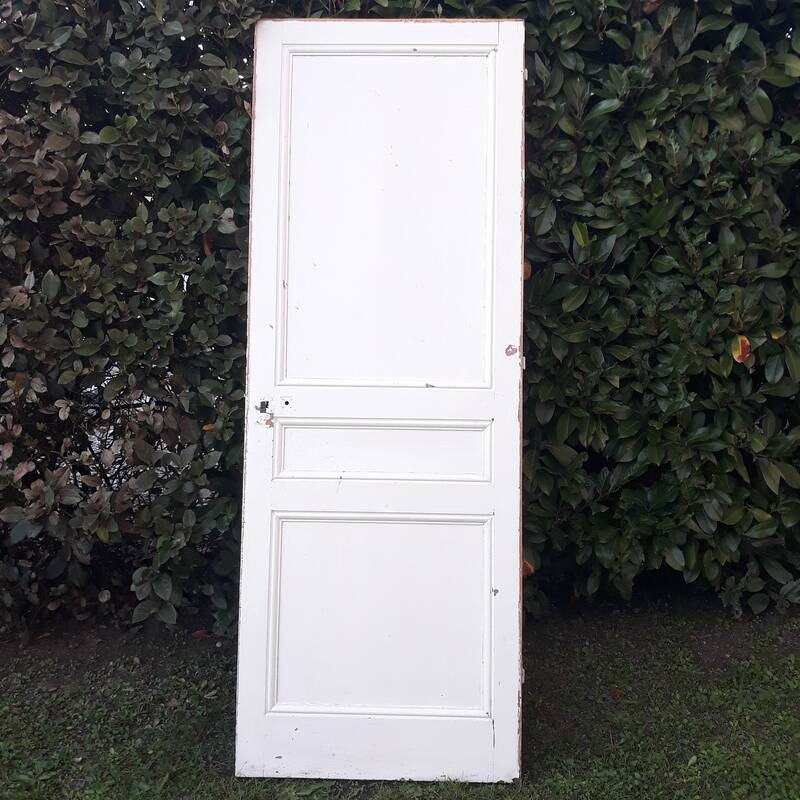Communication door H220xW80.5cm, old panelled with moulding.
