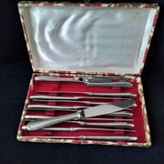 Set of 12 monobloc table knives in Comargent steel.