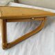 Corner shelf in rattan
