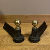 Pair of Napoleon III andirons from the 19th century in cast iron and brass