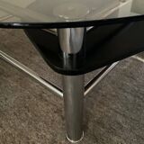Vintage coffee table from the 80s in smoked glass and chrome metal
