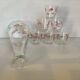 Carafe and 6 matching glasses in red and gold.