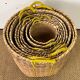 Set of 9 wicker trundle baskets