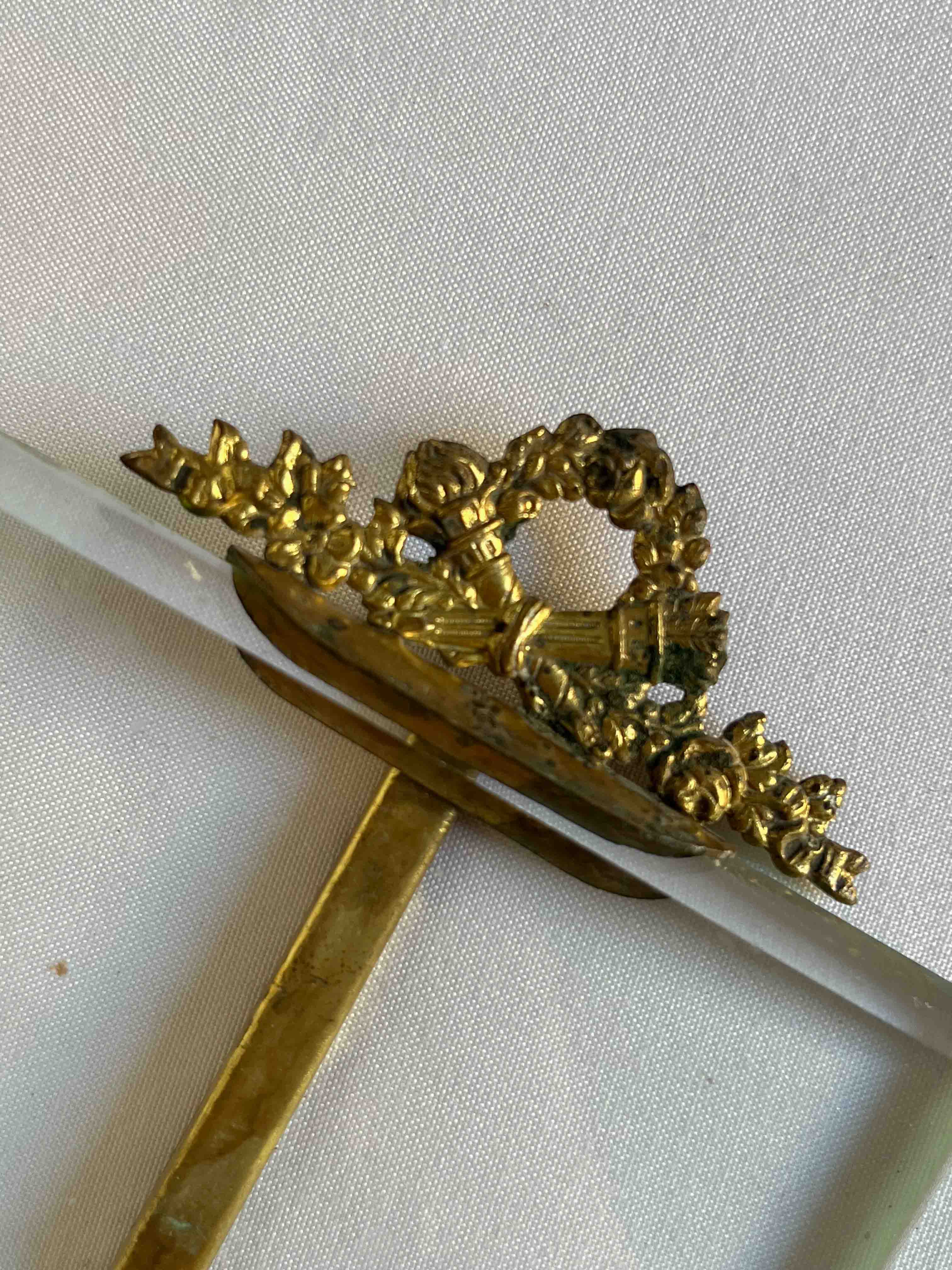 Brass frame and beveled glass