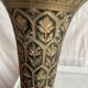 Pair of black and gold metal vase