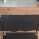 Vintage shelf of the 60s in golden metal and black plastic