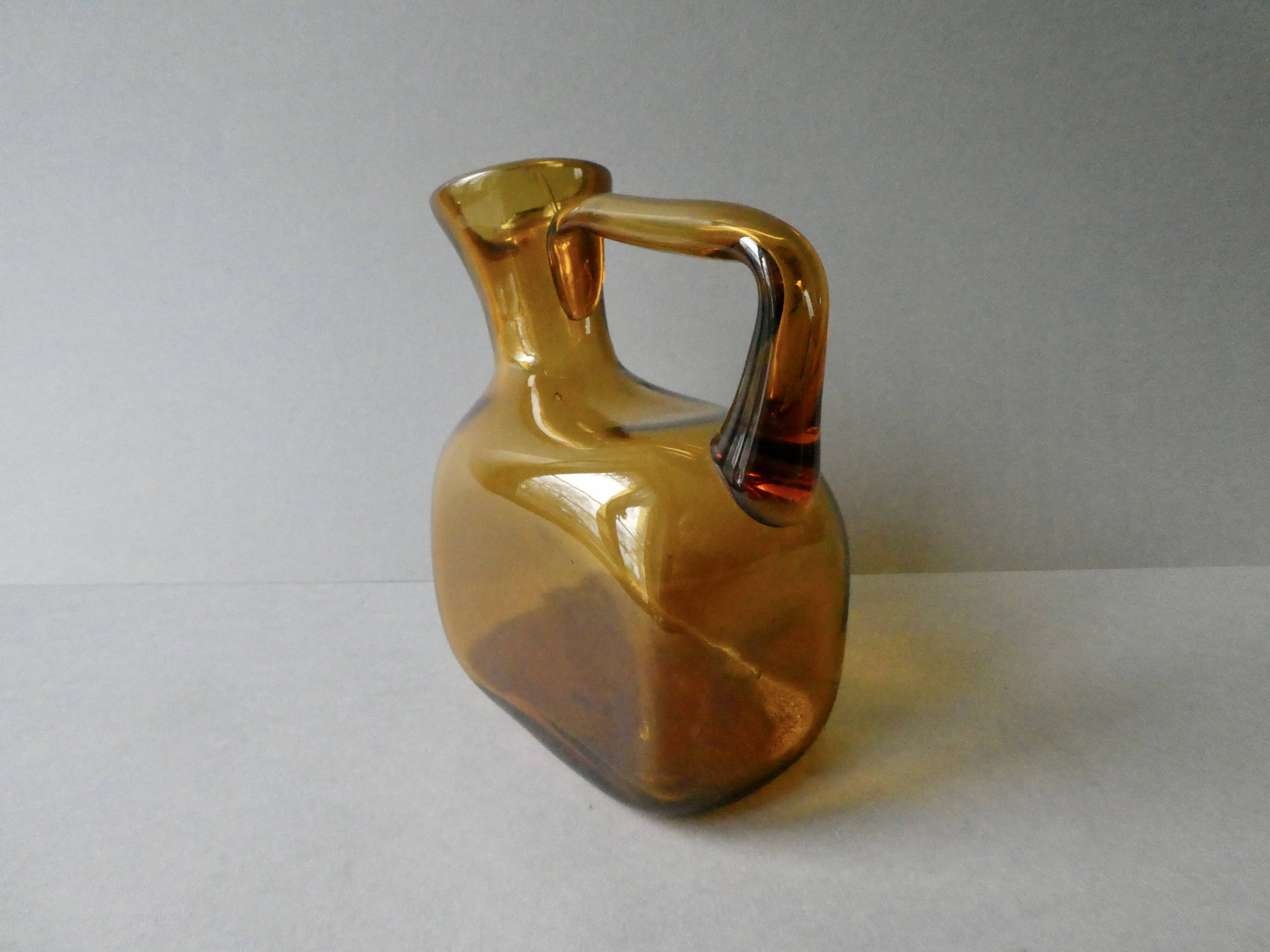 1 blown glass pitcher and its cups, 60s-70s