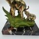 Art Deco bookends with elephants in brass and marble.