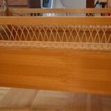 Child's bed in rattan of the years 50