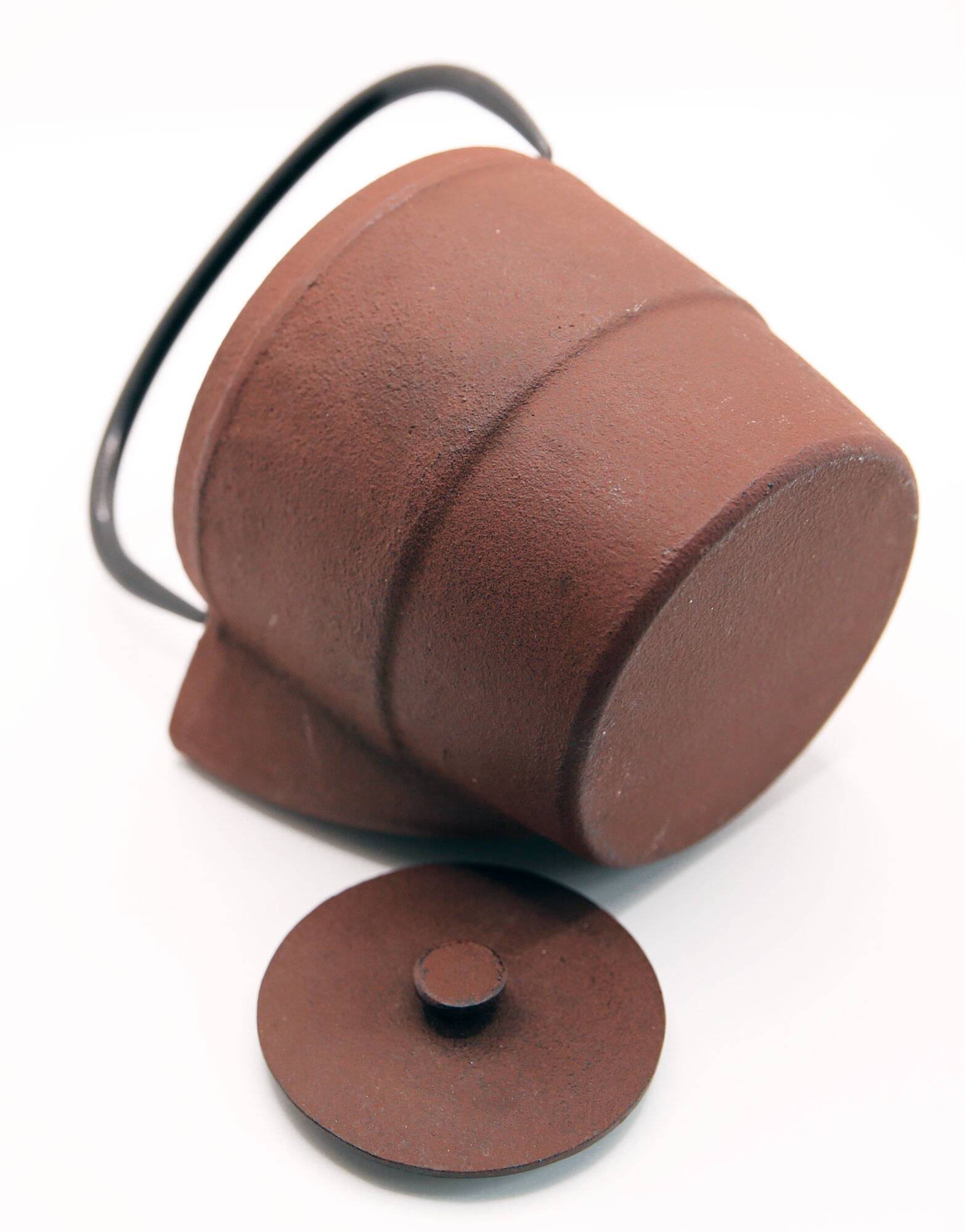 Cast iron chocolate teapot from Japan wabi sabi and its stainless steel filter