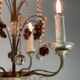 Silver bronze lustre garnished with pampilles, fruits and balls