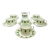 Set of 6 tea cups and 1 cream jug in Paris porcelain, Louis XVI decoration.
