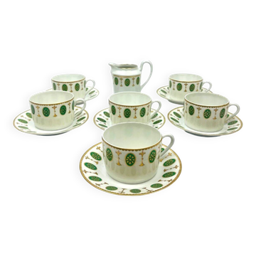 Set of 6 tea cups and 1 cream jug in Paris porcelain, Louis XVI decoration.