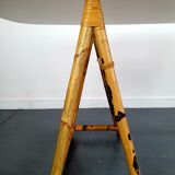 1970s dining table with bamboo trestle legs and smoked glass