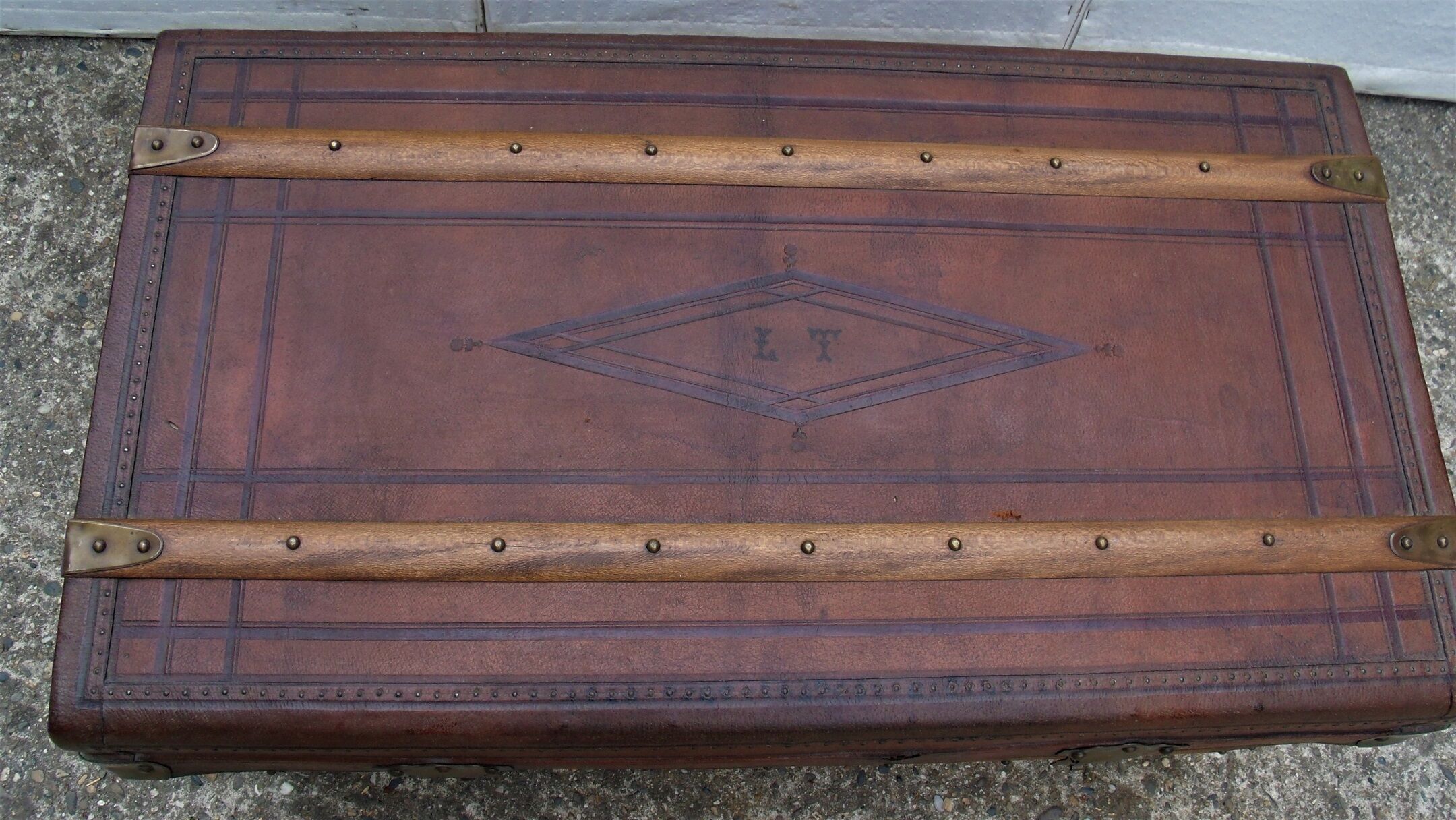 Old wooden trunk covered leather travel chest