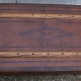 Old wooden trunk covered leather travel chest